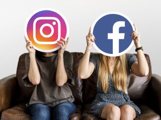 People holding social media icons